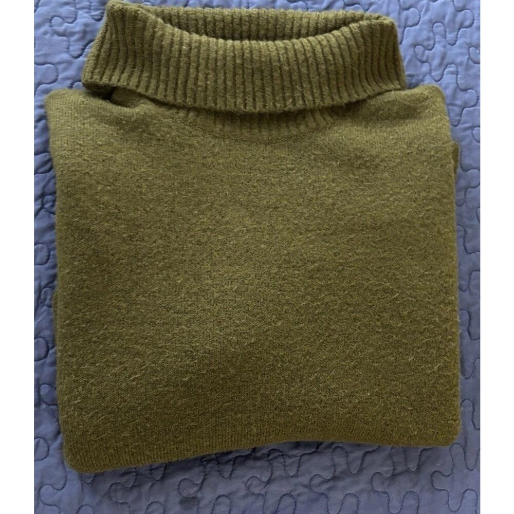 olive green turtleneck sweater features an oversized, relaxed silhouette 2X